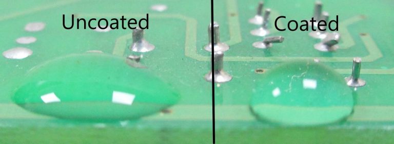 Water droplets on fluoropolymer coated and uncoated circuit board
